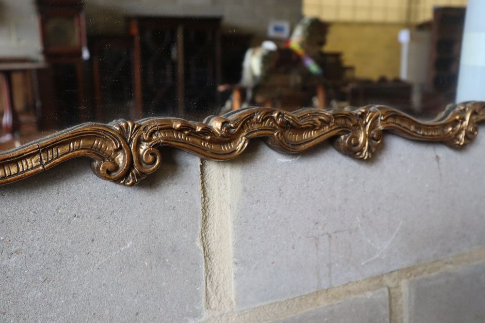 A gilt frame wall mirror, width 88cm